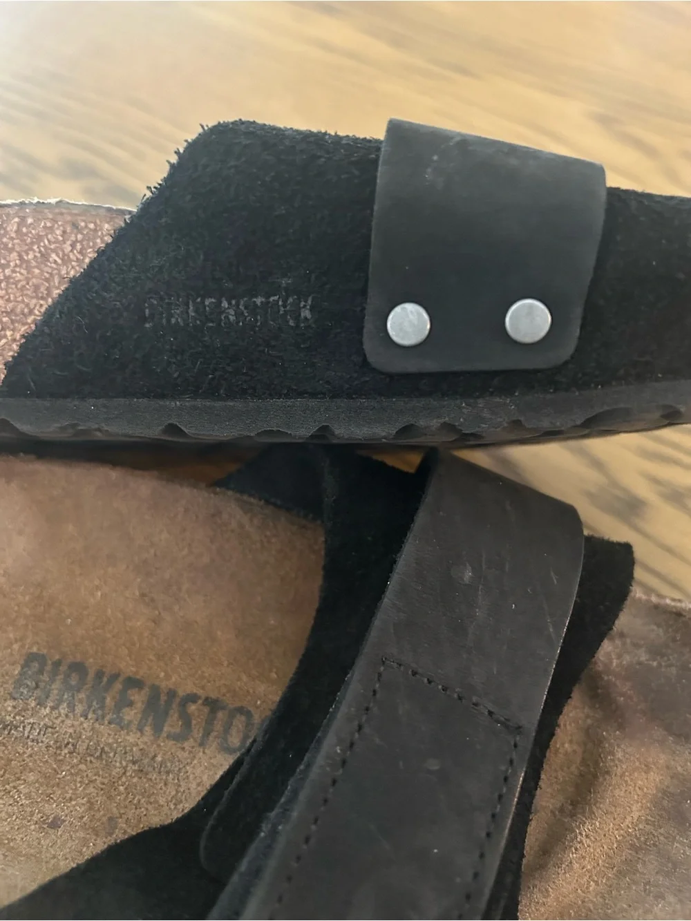 Birkenstock black slide sandals.